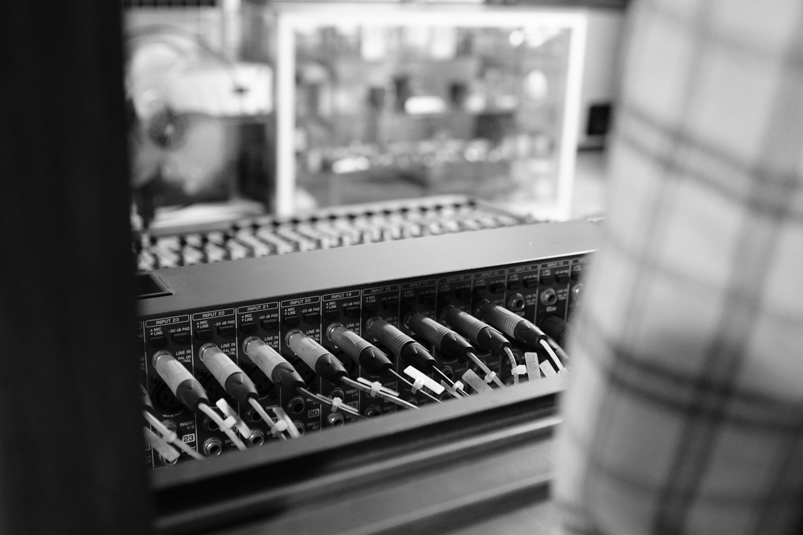 Audio cables connected to a studio patch panel