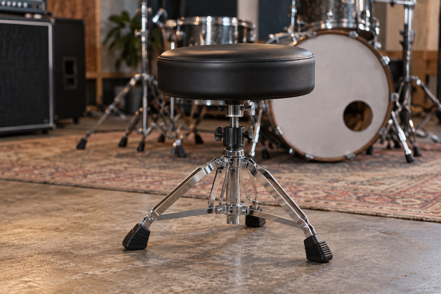 Adjustable drum throne in a rehearsal room